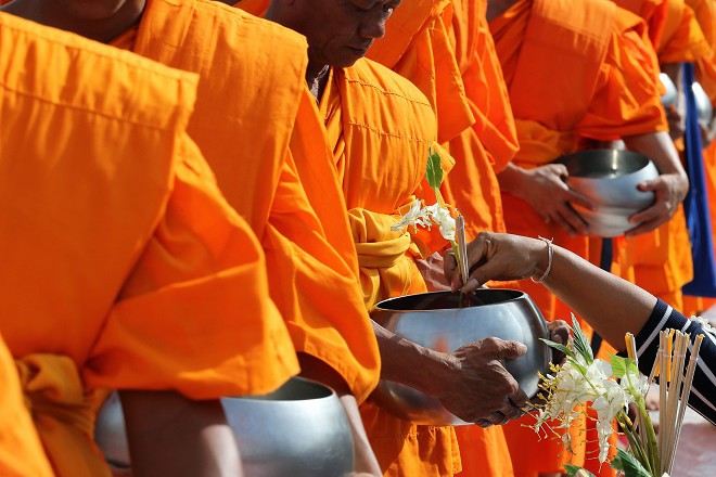 Floral merit-making ceremony for the Buddhist Lent